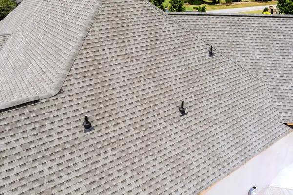 Roof Repairs for Asphalt, Metal, and Tile Roofs Compared